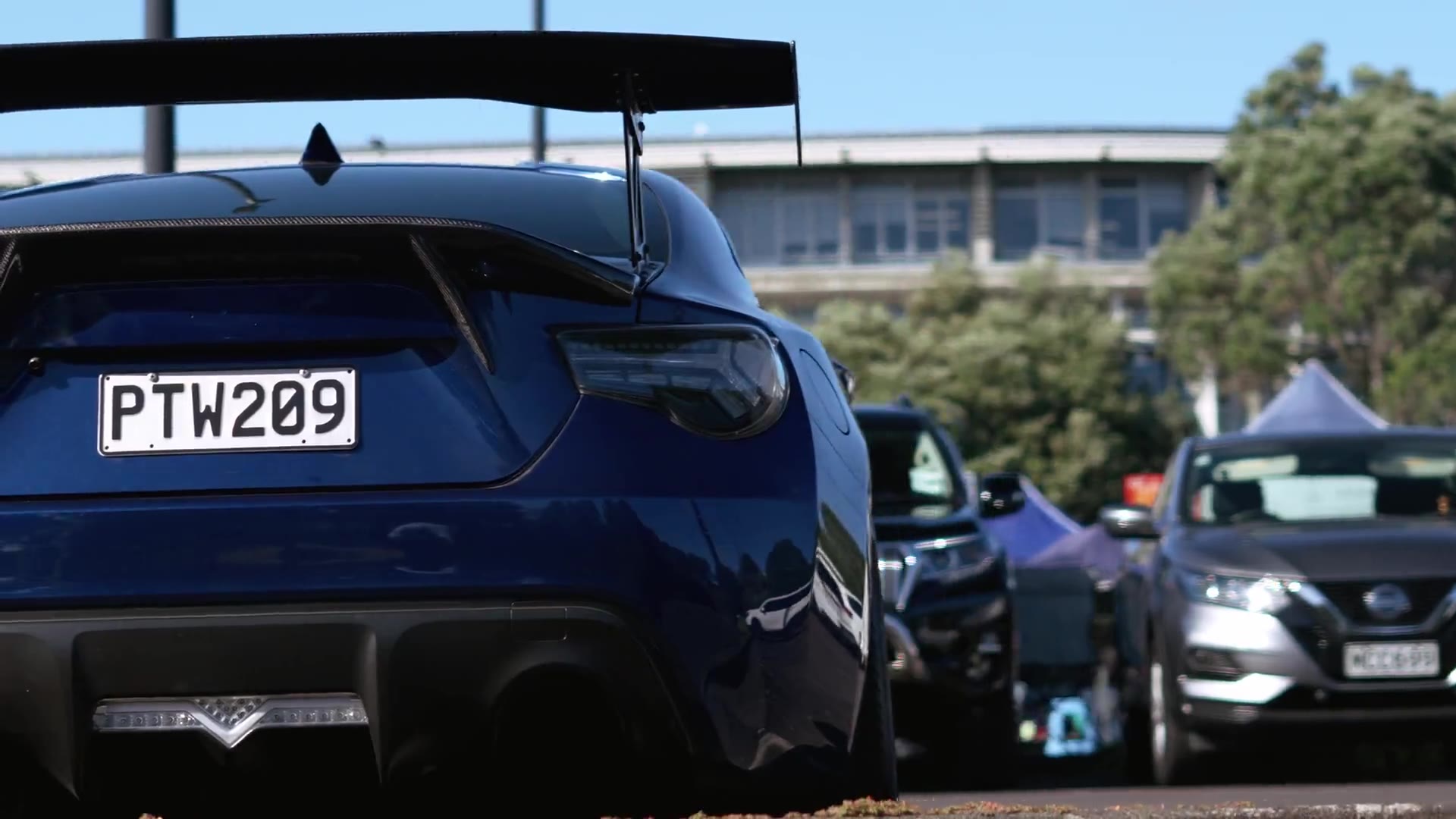Modified car photographed for a HoodUp build log